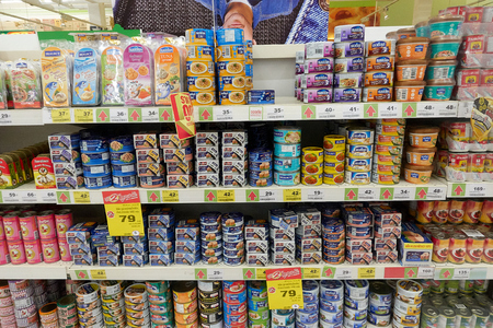 KOH SAMUI, THAILAND - December 13, 2017: Big C Supercenter. Various types of canned fish on the shelf in the supermarketのeditorial素材