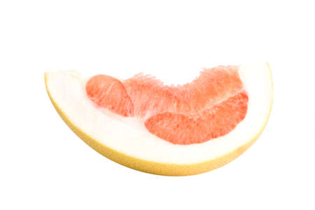 Fruit pomelo lies on a white background.Juicy red pulpの写真素材