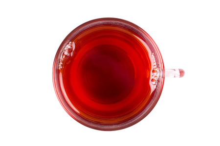 Black tea in a mug on a white background. Black tea in a cup top view.の写真素材
