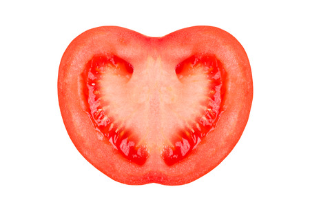 Half a fresh tomato on a white background.の写真素材