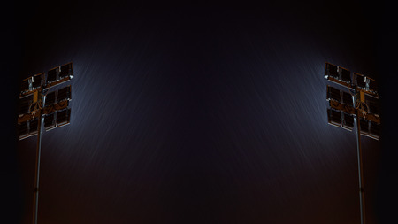 Two street lights glowing in the dark.の写真素材