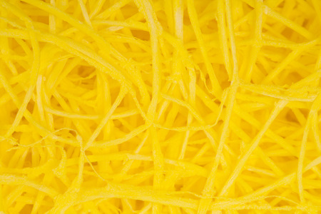 Yellow decorative straw closeup.の写真素材