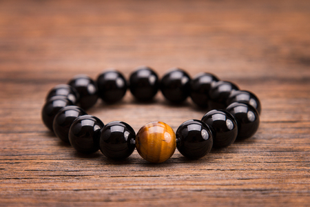 Stylish bracelet made of black stone beads.の写真素材