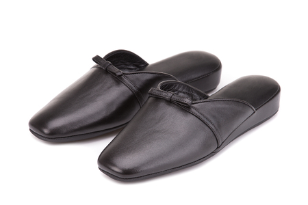 Home slippers isolate on a white background. Homemade leather slippers.の写真素材