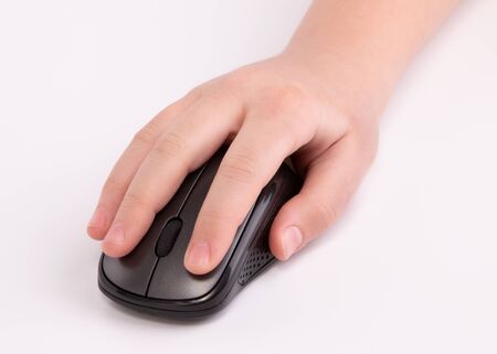 Computer mouse and hand on a white background.