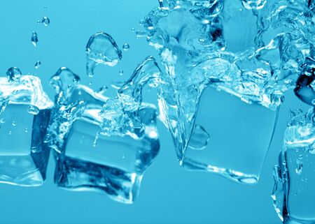 Ice cubes in blue water.