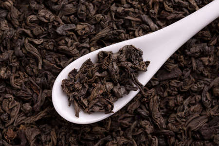 Black tea leaves close up.