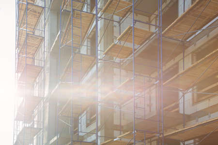 Scaffolding at a building under construction.の写真素材