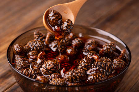 Small pine cones in sugar syrup.の写真素材