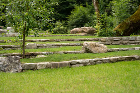 landscape design. Green lawn and stone partitions.の写真素材