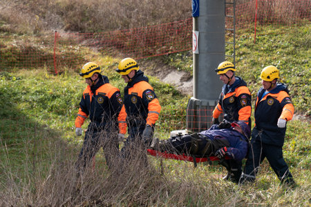 Sochi, Russia - November 16, 2022 Rescuers pull out the victim on a stretcher. Russian Emergency Situations Ministry.のeditorial素材
