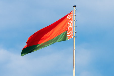 Flag of Belarus against the blue sky.の写真素材