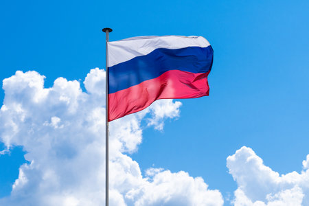 Russian flag against the sky.