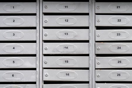 Mail boxes with overflowing documents and bills. Mailboxes for letters and correspondence.