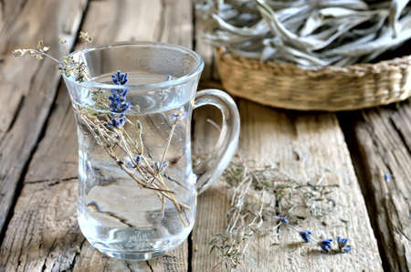 Relaxing spa tea with dried herbsの写真素材