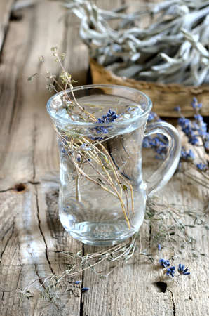 Relaxing spa tea with dried herbsの写真素材