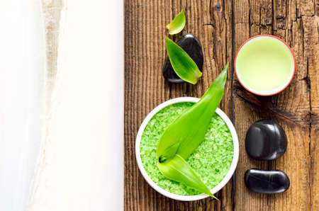 Spa background with a set of various spa treatment staff on a wooden surface. Wellness conceptの写真素材