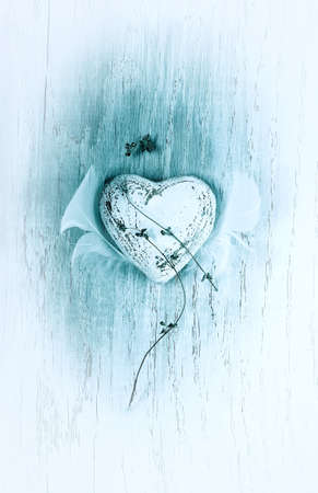 Stylized Valentine retro rustic background with a heart, love selebration symbolの写真素材