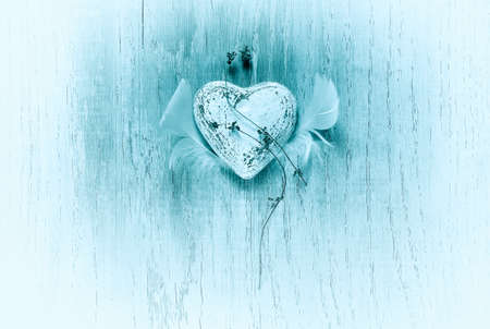 Stylized Valentine retro rustic background with a heart, love selebration symbolの写真素材