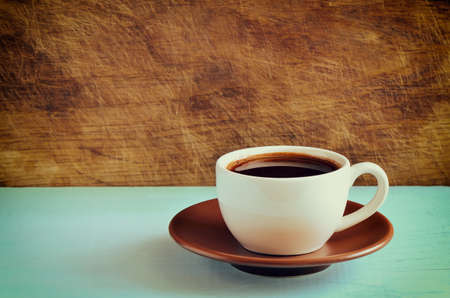 Retro stylized photo of a coffee cupの写真素材