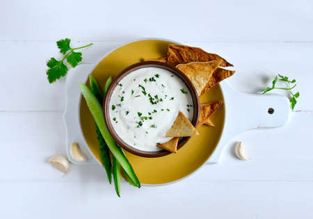 Traditional greek refreshing dip made of yogurt, cucumber and various herbsの写真素材
