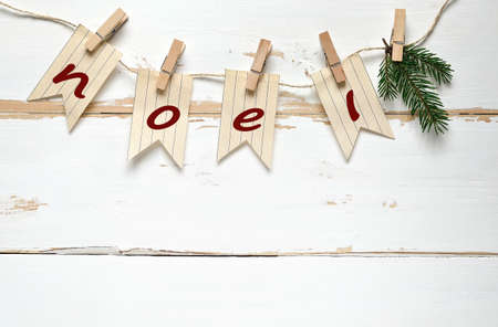 Word "Noel" written on festive retro garland of flagsの写真素材