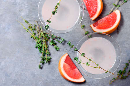 Grapefruit and thyme gin cocktail, vie from aboveの写真素材
