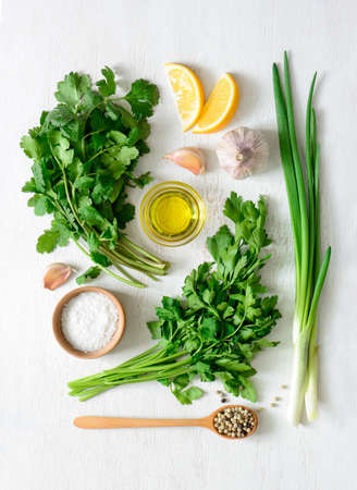 Chimichurri sauce basic ingredients, view from above, flat layの写真素材