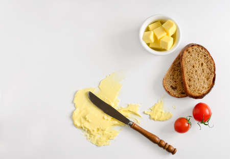 Butter, spread or margarine product background with a space for a text, flat lay, view from above