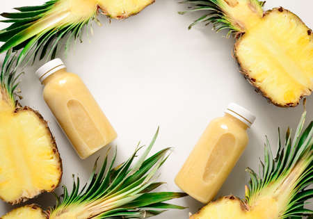 Pineapple smoothies or juice background, view from above, space for a textの写真素材