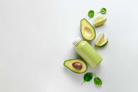 Avocado and spinach smoothies background with a space for a text, high angle viewの写真素材