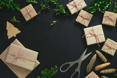 Christmas or New Year holiday background, packing presents concept, flat lay arrangment, view from above, space for a textの写真素材