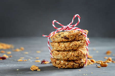 Granola pieces put in a stack and twined like a small present, homemade simple healthy snack