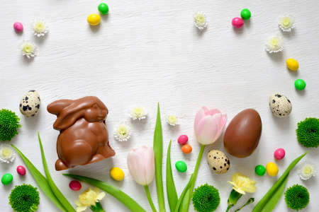 Easter greeting card or invitation leaflet tempate with a space for a text, flat lay, view from aboveの写真素材