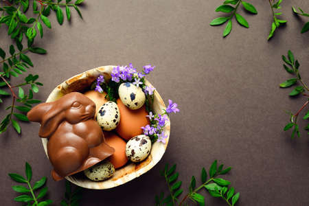 Easter greeting card or invitation leaflet tempate with a space for a text, flat lay, view from aboveの写真素材
