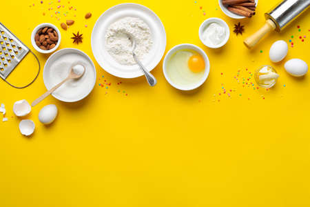 Easter bakery concept, various products for home holiday baking, such as sugar, butter, yogurt and...