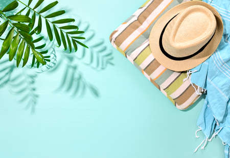 Sunny summer concept background with a strong shadow of palm leaf and blank space for a text, view from above, flat lay compositionの写真素材