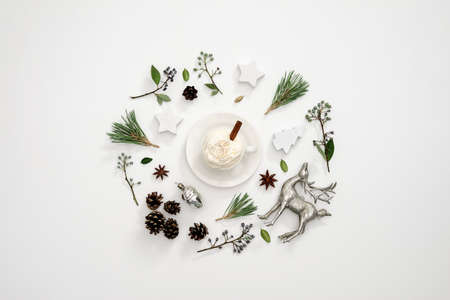 Winter creamy warmer concept, cup of coffee or cocoa with cream topping, view from aboveの写真素材