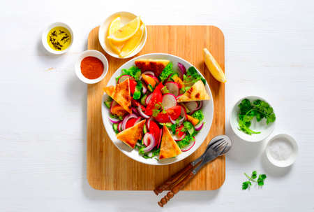 Homemade Fattoush salad served for one person, flatlayの写真素材
