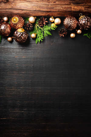 Christmas or New Year rustic moody background with blank space for a greeting textの写真素材