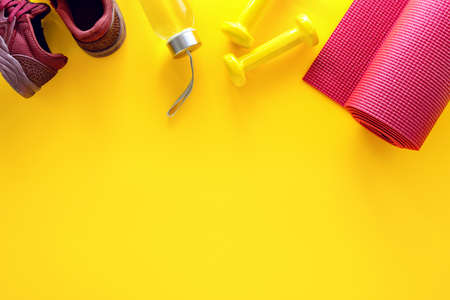 Yoga or fitness workout concept, fitness or weight loss activities background, flat lay composition, blank space for a textの写真素材