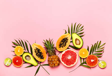 Summer tropical fruits composition, flat lay, space for a text aboveの写真素材