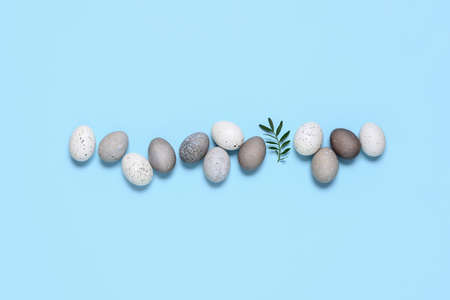 Naturally dyed Easter eggs background with copy space for a greeting text