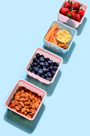 Flat lay healthy food lunch boxes concept, blank space for a textの写真素材