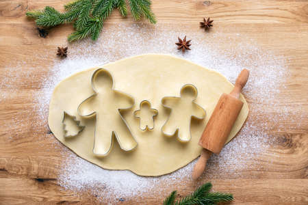 Christmas baking concept, happy gingerbread dough family, view from aboveの写真素材
