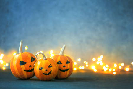 Halloween greeting background with copy space, cute pumpkin family concept, front viewの写真素材