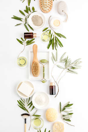 Spa concept with olive oil and olive leaf extract natural cosmetic ingredients, flat lay composition の写真素材