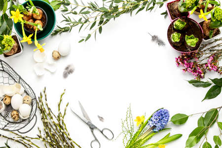 Florist or decorator table surface overhead view, Easter decoration concept with copy space for a...