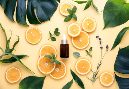 Natural cosmetics concept, fresh ingredients for skin treatment vitamin C serum, flat layの写真素材