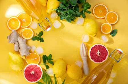 Summer lemonade, cocktail or another drink background with ingredients, top-down view, blank space for a textの写真素材